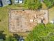 Overhead view of playground featuring slides, swings, and climbing areas for children at 9842 Lake Chase Island Way, Tampa, FL 33626