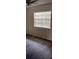 Cozy bedroom featuring modern floors and a bright window at 9902 N Myrtle St, Tampa, FL 33617