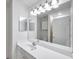 Bathroom featuring a large mirror, cabinet, and single vanity at 113 S Sherrill St # 113, Tampa, FL 33609