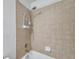 Bathtub with shower and tiled walls at 113 S Sherrill St # 113, Tampa, FL 33609