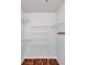 Walk-in closet with shelving and rod, maximizing storage space at 113 S Sherrill St # 113, Tampa, FL 33609