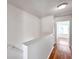 Bright hallway featuring hardwood floors and an entrance to another room at 113 S Sherrill St # 113, Tampa, FL 33609