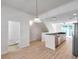 Modern kitchen boasts stainless steel appliances and an open floor plan great for entertaining at 113 S Sherrill St # 113, Tampa, FL 33609