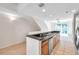 Bright kitchen featuring stainless steel appliances and an eat-in bar at 113 S Sherrill St # 113, Tampa, FL 33609