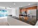 Modern kitchen with stainless steel appliances and granite countertops at 113 S Sherrill St # 113, Tampa, FL 33609