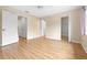 Bright bedroom with wood floors, multiple closets, and neutral paint at 11546 52Nd E Ct, Parrish, FL 34219