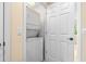 Laundry room with a stacked washer and dryer at 11546 52Nd E Ct, Parrish, FL 34219
