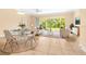 Comfortable living room with tile floors, natural light and modern furnishings at 11546 52Nd E Ct, Parrish, FL 34219