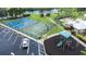 Community sports area with tennis court, basketball court, playground and parking lot at 11546 52Nd E Ct, Parrish, FL 34219