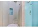 Close-up of newly remodeled shower with glass accents and a corner seat at 1217 N Florida Ave, Tarpon Springs, FL 34689