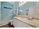 Spa bathroom with modern countertops, bright vanity, and an upgraded glass shower at 1217 N Florida Ave, Tarpon Springs, FL 34689