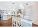 Bright and open dining area featuring a dining table with seating for six guests at 1217 N Florida Ave, Tarpon Springs, FL 34689
