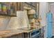 Custom kitchen with stainless steel appliances, unique backsplash, and granite countertops at 1217 N Florida Ave, Tarpon Springs, FL 34689