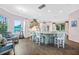 Open kitchen featuring an island with seating, modern appliances, and ample cabinet space at 1217 N Florida Ave, Tarpon Springs, FL 34689