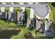 Birds eye view featuring modern homes with well-kept yards and a peaceful pond at 12593 Retreat Pl, Spring Hill, FL 34610