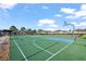 Enjoy a game of basketball on the community's court, perfect for staying active and socializing with neighbors at 12593 Retreat Pl, Spring Hill, FL 34610