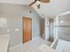 Bathroom featuring vanity and a glass enclosed shower along with neutral paint and tile at 13094 Huntington Woods Ave, Spring Hill, FL 34609