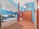 Bright open-concept living room with comfortable seating and an inviting atmosphere at 13094 Huntington Woods Ave, Spring Hill, FL 34609