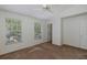 Well-lit bedroom with large windows offering pleasant views at 13521 Forest Lake Dr, Largo, FL 33771