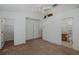 Spacious main bedroom features high ceilings, walk-in closet, and ensuite bathroom access at 13521 Forest Lake Dr, Largo, FL 33771