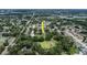 Aerial view of home in a neighborhood, highlighting its proximity to a pond and community spaces at 1617 Dawnridge Ct, Brandon, FL 33510