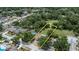 Aerial view showcases property boundaries, nestled among trees at 1617 Dawnridge Ct, Brandon, FL 33510