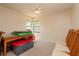 Bedroom with a ceiling fan and natural light from the window at 1617 Dawnridge Ct, Brandon, FL 33510
