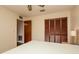 Bedroom features a closet and natural light from side-table lamps at 1617 Dawnridge Ct, Brandon, FL 33510