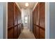 Hallway with carpet and plentiful wood closet space at 1617 Dawnridge Ct, Brandon, FL 33510