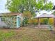 A well maintained backyard featuring a detached building, brick patio and a cozy gazebo at 1620 15Th N St, St Petersburg, FL 33704