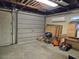Unfinished basement area has a garage door and ample storage at 1620 15Th N St, St Petersburg, FL 33704
