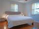 Cozy bedroom with hardwood floors, natural light, and neutral decor at 1620 15Th N St, St Petersburg, FL 33704