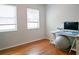 Hardwood floor bedroom with two windows and a desk at 1620 15Th N St, St Petersburg, FL 33704