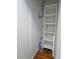 A utility closet featuring shelving and space to store filters and cleaning equipment at 1620 15Th N St, St Petersburg, FL 33704