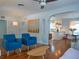Open-concept living room features hardwood floors, modern furnishings, and seamless flow into the kitchen at 1620 15Th N St, St Petersburg, FL 33704