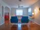 Cozy living room with original hardwood floors, an abundance of natural light, and stylish modern furniture at 1620 15Th N St, St Petersburg, FL 33704