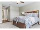 Cozy bedroom with a comfortable bed, plush pillows, and soft lighting at 18696 Malinche Loop, Spring Hill, FL 34610