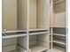 An organized closet with shelves, drawers and hanging rods to maximize storage at 18696 Malinche Loop, Spring Hill, FL 34610