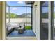 Enjoy the outdoors from this screened-in lanai with comfortable outdoor furniture at 18696 Malinche Loop, Spring Hill, FL 34610