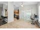 Breakfast nook featuring tile flooring and a view of the screened-in outdoor living space at 19555 Phillips Rd, Brooksville, FL 34604