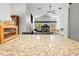 Kitchen with bar top, modern light fixture, and an open design with views of the living room at 19555 Phillips Rd, Brooksville, FL 34604