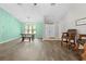 Living room featuring new laminate flooring, natural light and vaulted ceilings at 19555 Phillips Rd, Brooksville, FL 34604