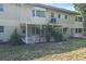 Expansive backyard with a covered patio and beautiful landscaping, ideal for outdoor living at 2192 Swedish Dr # 10, Clearwater, FL 33763