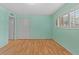Bright bedroom with windows, closet and neutral walls at 2192 Swedish Dr # 10, Clearwater, FL 33763