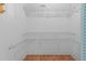 Walk-in closet featuring white wire shelving at 2192 Swedish Dr # 10, Clearwater, FL 33763