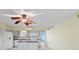Inviting kitchen featuring an island, updated appliances, and abundant storage at 2192 Swedish Dr # 10, Clearwater, FL 33763