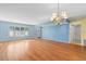 Inviting living room with wood flooring and ample natural light at 2192 Swedish Dr # 10, Clearwater, FL 33763