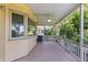 Inviting covered porch perfect for relaxing, surrounded by lush landscaping at 2192 Swedish Dr # 10, Clearwater, FL 33763