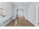 Bright and airy living room featuring a large window and modern wood floors at 2320 W Walnut St, Tampa, FL 33607