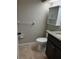 This bathroom features tile flooring, a toilet, and granite countertops at 2332 S Fairway Dr, Plant City, FL 33566